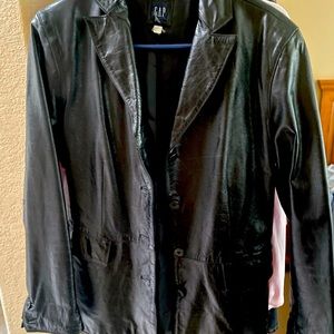 Women’s mid length leather coat